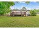 A home's backyard and deck are surrounded by a chain-link fence at 1350 Redford Se Dr, Atlanta, GA 30315
