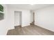 Bright bedroom with hardwood floors, closet, and window with outside view at 1350 Redford Se Dr, Atlanta, GA 30315