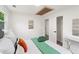 Bedroom featuring a bed and two side tables, plus a closet and additional door at 1350 Redford Se Dr, Atlanta, GA 30315