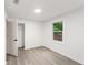 Bright bedroom with hardwood floors, closet, and window with natural light at 1350 Redford Se Dr, Atlanta, GA 30315