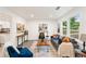 Sunlit living room featuring hardwood floors, stylish furniture, and an open concept design at 1350 Redford Se Dr, Atlanta, GA 30315