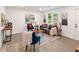 Inviting living room with modern furnishings, hardwood floors, natural light, and neutral paint scheme at 1350 Redford Se Dr, Atlanta, GA 30315