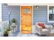 Cozy front porch featuring a wooden door, comfortable seating, and stylish accents at 1977 Nash Se Ave, Atlanta, GA 30316