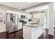 Modern kitchen with white cabinets, stainless steel appliances, granite countertops, and a center island at 1977 Nash Se Ave, Atlanta, GA 30316