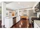 Spacious kitchen featuring an island with a sink, stainless steel appliances, and open access to the living area at 1977 Nash Se Ave, Atlanta, GA 30316