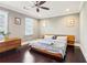 Contemporary bedroom featuring dark wood floors, ceiling fan, and two windows at 1977 Nash Se Ave, Atlanta, GA 30316