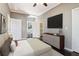 Bedroom with neutral tones, ensuite bathroom, and television at 1977 Nash Se Ave, Atlanta, GA 30316