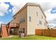 Exterior side view of home with a fenced backyard, wood deck, and an HVAC system at 3845 New Salem Ct, Cumming, GA 30040