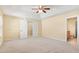 A spacious bedroom provides ample storage with an open closet and view of the bathroom at 3845 New Salem Ct, Cumming, GA 30040