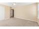 Bedroom featuring neutral carpet, natural light from a window, a ceiling fan, and a closet at 3845 New Salem Ct, Cumming, GA 30040
