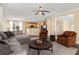Open concept living area with stylish furnishings, seamlessly connecting to the kitchen and dining area at 3845 New Salem Ct, Cumming, GA 30040