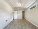 Finished basement featuring a painted brick wall and natural light from windows at 4239 Canby Ln, Decatur, GA 30035