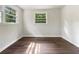 Clean and airy bedroom featuring sleek floors and ample natural light at 4239 Canby Ln, Decatur, GA 30035