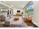 Bright and airy living room with stylish furniture and large windows at 4239 Canby Ln, Decatur, GA 30035