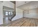 Open-concept space with staircase, a front door and ample windows that provide great natural light at 58 Longhorn Way, Auburn, GA 30011