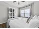 Comfortable bedroom with bright natural light and ceiling fan at 635 Broadview Ne Pl, Atlanta, GA 30324