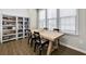 Dining area with table near natural light and a bookshelf at 635 Broadview Ne Pl, Atlanta, GA 30324