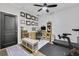 Bright and airy home office with ceiling fan and exercise equipment at 635 Broadview Ne Pl, Atlanta, GA 30324