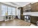 Spacious kitchen with stainless steel appliances, ample counter space, and wood flooring at 635 Broadview Ne Pl, Atlanta, GA 30324