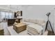 Open floor plan with a spacious living room and modern kitchen in the background at 635 Broadview Ne Pl, Atlanta, GA 30324
