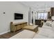 Open living room features a flat screen TV and modern decor at 635 Broadview Ne Pl, Atlanta, GA 30324