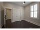 Bedroom featuring hardwood floors, recessed lighting, and closet space at 4143 N Swann St, Covington, GA 30014