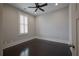 Bedroom featuring hardwood floors, ceiling fan, recessed lighting, and neutral color at 4143 N Swann St, Covington, GA 30014