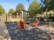 Outdoor common area with fire pit and Adirondack chairs provides space for gathering at 4143 N Swann St, Covington, GA 30014