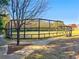 Fully fenced dog park and walking trail offers exercise space at 4143 N Swann St, Covington, GA 30014