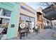 Inviting exterior of '@local.' cafe boasts outdoor seating and a contemporary design, perfect for socializing at 4143 N Swann St, Covington, GA 30014