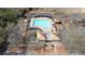 Aerial view of community pool with ample seating, covered picnic area and bath house at 4143 N Swann St, Covington, GA 30014