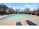 Large community pool with lounge chairs and pergola is a great place to relax at 4143 N Swann St, Covington, GA 30014