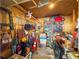 Storage room with shelving, work bench, and assorted materials at 4143 N Swann St, Covington, GA 30014