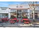 Exterior view of 'Your Pie' restaurant, featuring outdoor seating and a modern storefront design at 4143 N Swann St, Covington, GA 30014