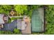 Aerial view highlighting garden, tennis court and lush property at 44 Muscogee Nw Ave, Atlanta, GA 30305
