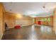 A basement with wood walls, herringbone tile floor, a vintage Coke machine, and recessed lighting at 44 Muscogee Nw Ave, Atlanta, GA 30305
