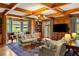 Bright living room with coffered ceiling, fireplace, and comfortable seating at 44 Muscogee Nw Ave, Atlanta, GA 30305