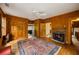 Inviting living room with hardwood floors, fireplace, and ornate rug at 44 Muscogee Nw Ave, Atlanta, GA 30305
