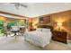The main bedroom boasts ample natural light, comfortable seating, and neutral decor at 44 Muscogee Nw Ave, Atlanta, GA 30305