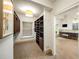 Organized walk-in closet featuring ample shelving, hanging space, and easy access to the bathroom at 44 Muscogee Nw Ave, Atlanta, GA 30305