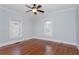 Bedroom with hardwood floors, ceiling fan, and plenty of natural light at 744 Oakland Se Ave, Atlanta, GA 30315