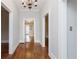 Hallway with wooden floors and neutral wall paint at 744 Oakland Se Ave, Atlanta, GA 30315