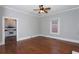 Bright living room with hardwood floors and view into updated kitchen at 744 Oakland Se Ave, Atlanta, GA 30315