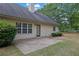 Home backyard featuring a concrete patio at 1561 Oak Ivy Ln, Lawrenceville, GA 30043