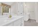 Bright bathroom with dual sinks and vanity at 1561 Oak Ivy Ln, Lawrenceville, GA 30043