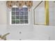 Bathroom featuring a large tub with jets at 1561 Oak Ivy Ln, Lawrenceville, GA 30043