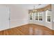 Dining room with wood floors and large windows at 1561 Oak Ivy Ln, Lawrenceville, GA 30043