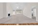 Bright living room featuring high ceilings, a fireplace, and access to the yard at 1561 Oak Ivy Ln, Lawrenceville, GA 30043