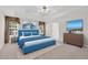 Serene main bedroom featuring tray ceilings, soft colors, and modern furnishings at 1561 Oak Ivy Ln, Lawrenceville, GA 30043