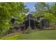 Stunning backyard with multi-level deck and lush landscaping at 1860 Mountain Shadow, Stone Mountain, GA 30087